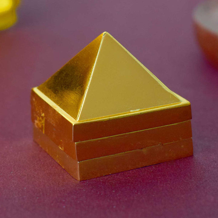 Brass Vastu Pyramid (Vastu Devta Yantra) featuring 45 deity zones, designed to balance energy flow, correct Vastu dosh, and bring prosperity and peace to any space.
India’s Largest Pooja Accessories Brand - www.satvikstore.in