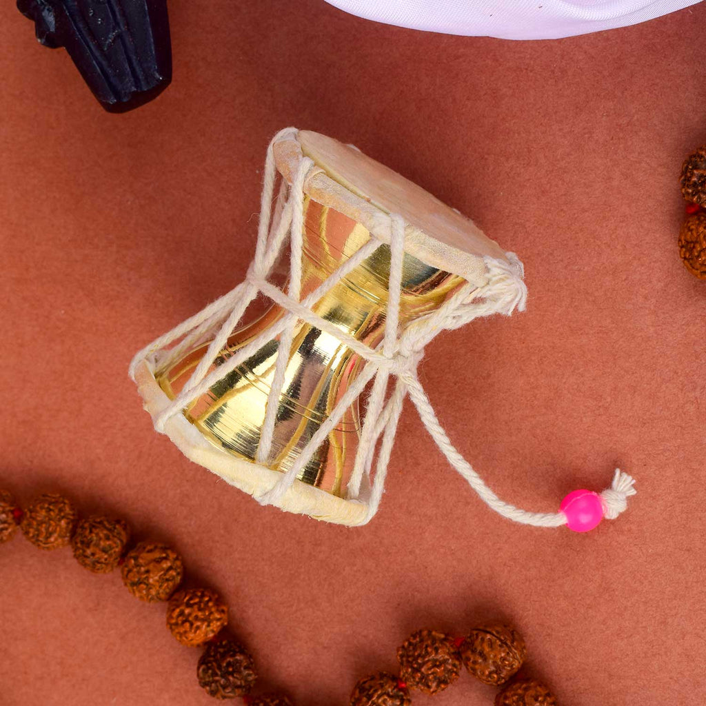 2.5 Inch Divine Brass Damru for Lord Shiva, beautifully handcrafted – ideal for spiritual rituals and pooja. India’s Largest Pooja Accessories Brand – www.satvikstore.in