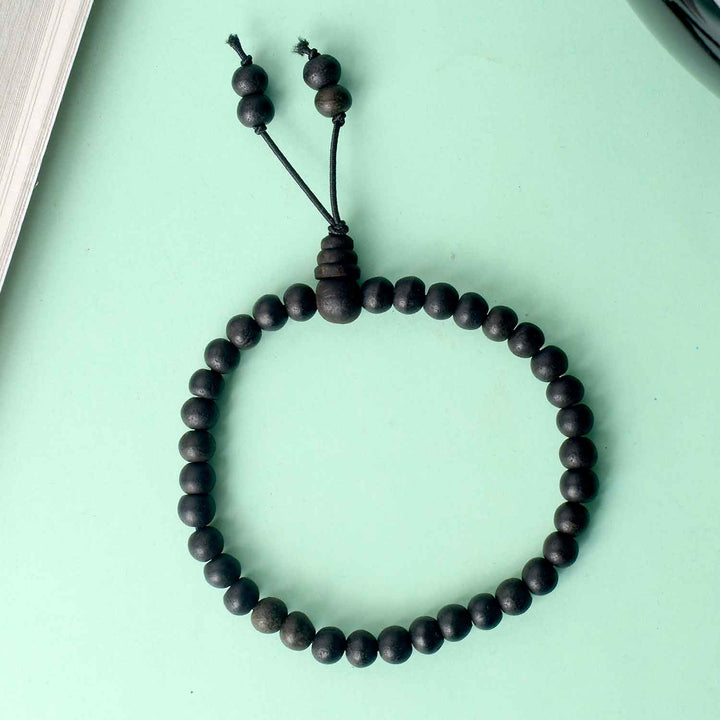 6mm Ebony Bracelet with Matte Finish – elegant black wooden bead bracelet with a smooth, non-reflective surface for a subtle and spiritual look. India’s Largest Pooja Accessories Brand - www.satvikstore.in 