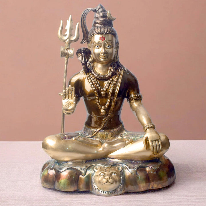 Large Brass Idol of 17 Inch Brass Shiva Idol in Meditative Posture. Embodying peace and spiritual focus, this 17-inch Brass Shiva Idol features Lord Shiva in a serene meditative posture. Known as the ultimate yogi, Lord Shiva is beautifully represented here with intricate detailing in brass, capturing the tranquility and profound wisdom of his meditation. on www.satvikstore.in