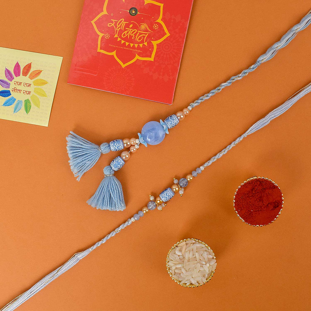 Designer Couple Rakhi Set for Bhaiya and Bhabhi with Roli Chawal and Ram Sita Stickers – Raksha Bandhan Gift Combo. India’s Largest Brass Idols Brand - www.satvikstore.in