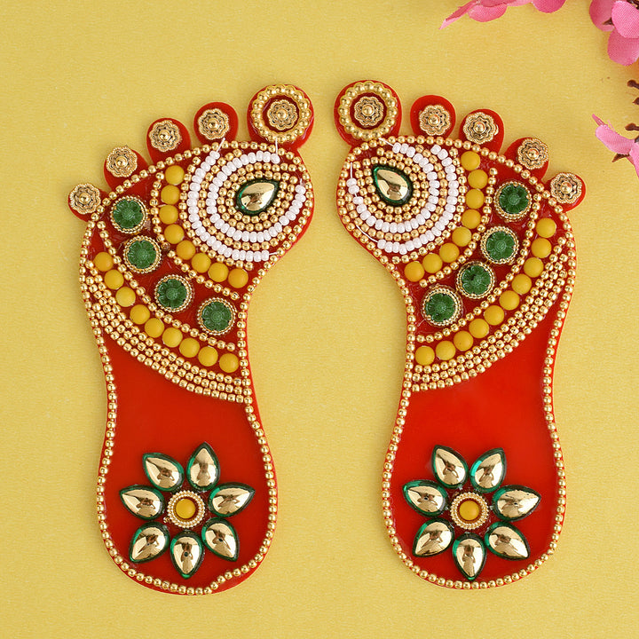 Auspicious Laxmi Charan Paduka – Prosperity’s Footprints Sticker, symbolic Lakshmi footprints in sticker form used for pooja room, entrance decor, and attracting divine blessings of wealth and fortune. 
India’s Largest Pooja Accessories Brand – www.satvikstore.in 