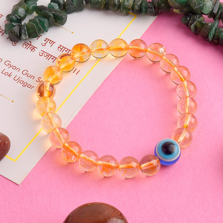 Authentic Citrine with Evil Eye Bracelet for Abundance, Luck, and Spiritual Protection. India’s Largest Pooja Accessories Brand – www.satvikstore.in
