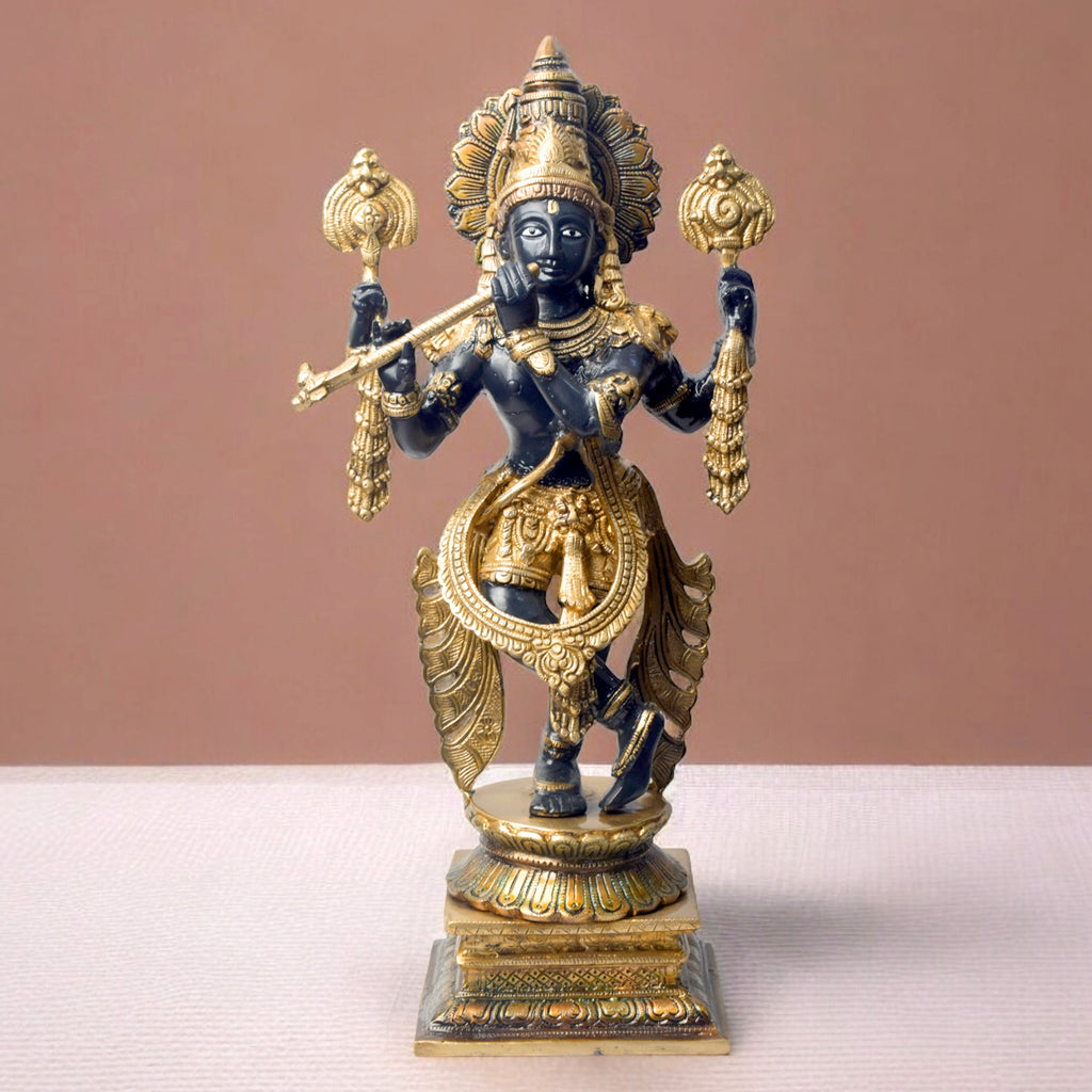 Large Brass Idol of 19 Inch Brass Chola Krishna Sculpture Playing the Flute. Bring home the divine charm of Lord Krishna with this exquisite 19-inch Brass Chola Krishna Sculpture. Expertly crafted, this statue captures Lord Krishna in his iconic pose, gracefully playing the flute.