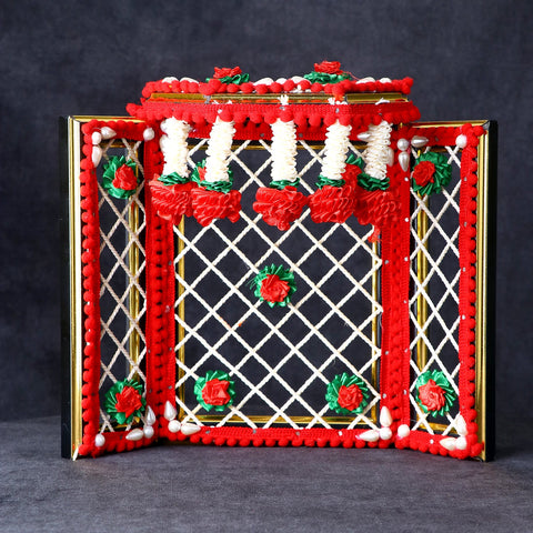 Beautiful Phool Bangla floral decoration designed for Eco Friendly Ganesha idol, featuring vibrant fresh flowers arranged in a traditional style to enhance festive decor and spiritual ambiance. India’s Largest Pooja Accessories Brand – www.satvikworld.com