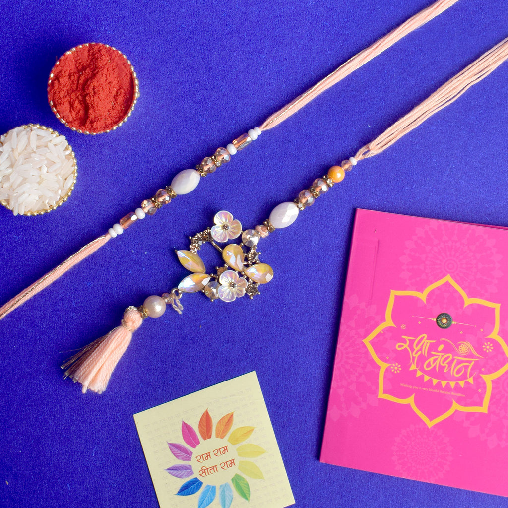 Designer Couple Rakhi Set for Bhaiya and Bhabhi with Roli Chawal and Ram Sita Stickers – Raksha Bandhan Gift Combo. India’s Largest Brass Idols Brand - www.satvikstore.in