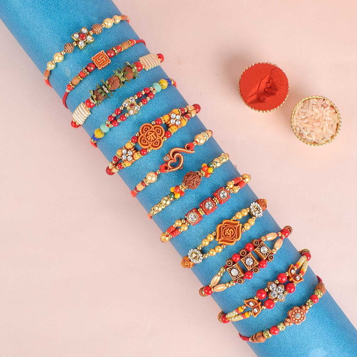 Assortment of 12 Rakhis, featuring different designs, threads, and embellishments for Raksha Bandhan. India’s Largest Pooja Accessories Brand - www.satvikstore.in