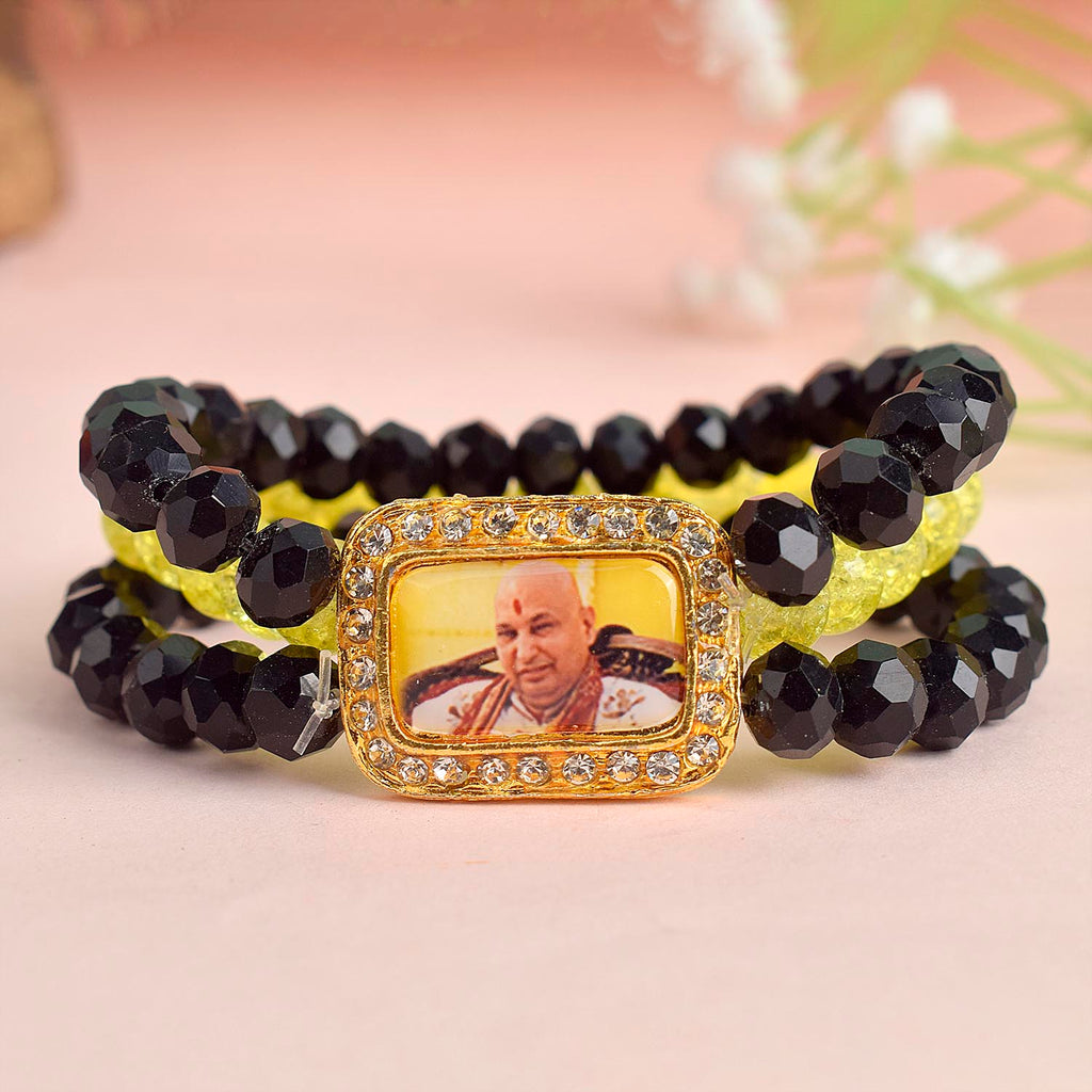 Black & Neon Yellow Triple Layer Guruji Swaroop Bracelet featuring sleek black beads with electric neon yellow middle layer and Jai Guruji Swaroop – perfect for spiritual wear, meditation, and gifting. India’s Largest Pooja Accessories Brand – www.satvikstore.in