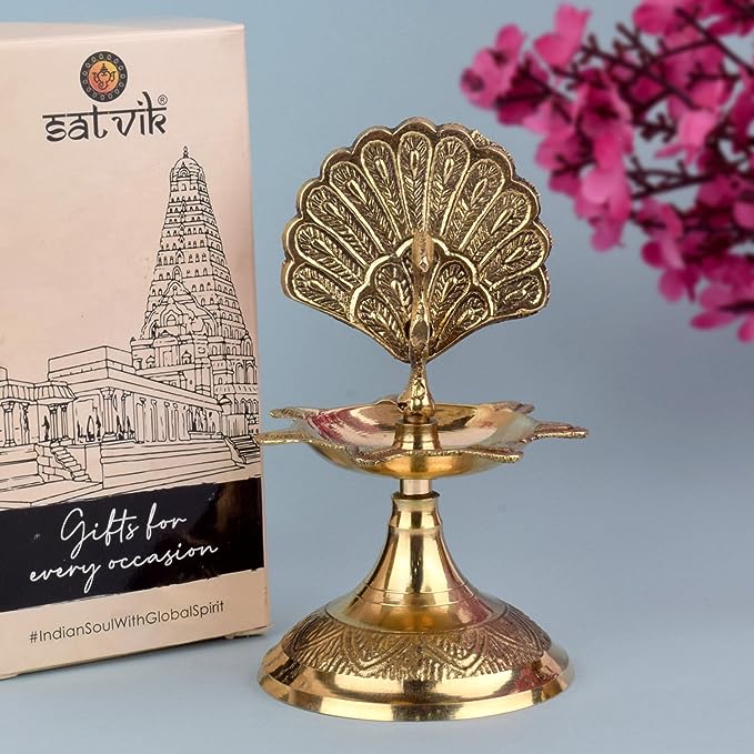 Handcrafted Brass Flying Peacock Kerala Samai Deepam Puja Diya – Exquisite brass diya in the shape of a flying peacock, designed for traditional Kerala-style rituals and pooja ceremonies. India’s Largest Pooja Accessories Brand – www.satvikstore.in