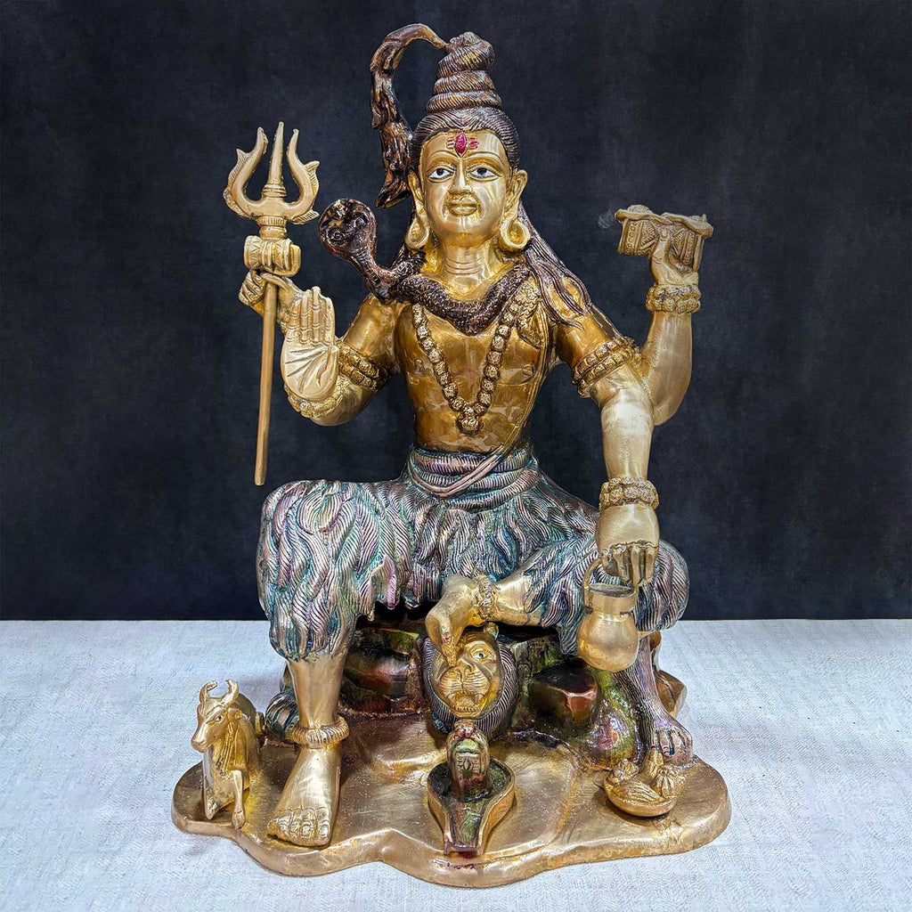 Brass Idol of 18.5 Inch Handcrafted Brass Statue of Lord Shiva. Bring divine energy and serenity into your space with this stunning 18.5-inch Brass Statue of Lord Shiva. Expertly crafted from high-quality brass, this statue beautifully depicts Lord Shiva in a powerful yet peaceful stance, symbolizing, strength and tranquility. India's Largest Puja Accessories Brand - Satvik