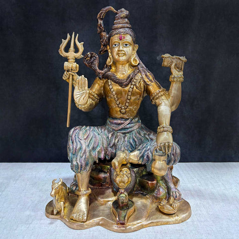 Brass Idol of 18.5 Inch Handcrafted Brass Statue of Lord Shiva. Bring divine energy and serenity into your space with this stunning 18.5-inch Brass Statue of Lord Shiva. Expertly crafted from high-quality brass, this statue beautifully depicts Lord Shiva in a powerful yet peaceful stance, symbolizing, strength and tranquility. India's Largest Puja Accessories Brand - Satvik