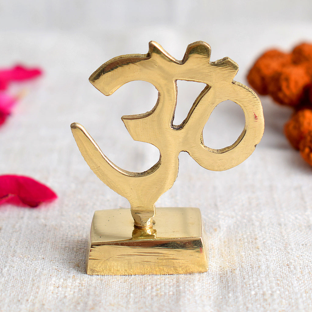 Elegant Brass OM Sculpture for Car Dashboard, symbolizing peace, spirituality, and divine energy, perfect for enhancing your vehicle's sacred decor. India’s Largest Pooja Accessories Brand – www.satvikstore.in 