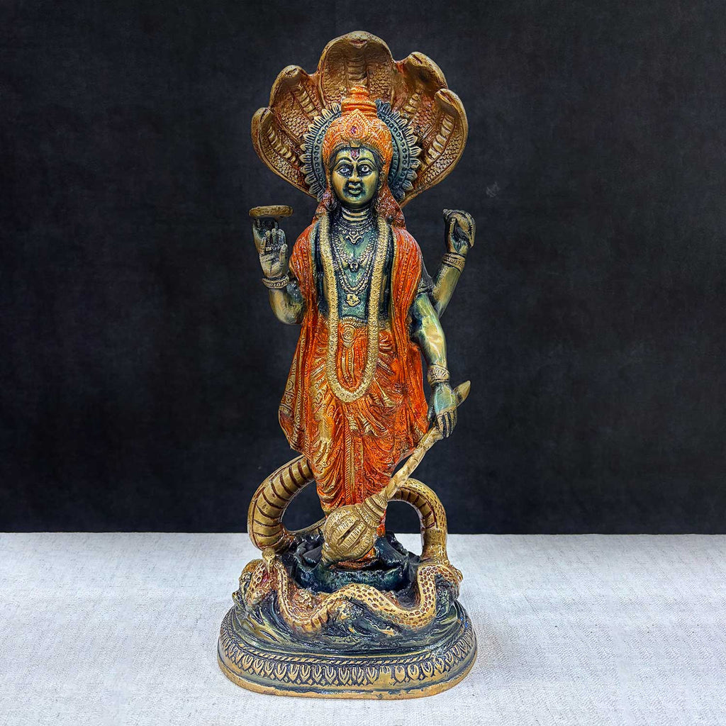  Brass Idol of 17 Inch Brass Vishnu Standing with Sheshanag. Bring divine protection and blessings into your home with this stunning 17-inch Brass Vishnu Standing with Sheshanag Idol. This intricately crafted statue features Lord Vishnu, the preserver of the universe, standing gracefully atop the Sheshanag (cosmic serpent). India's Largest Puja Accessories Brand - Satvik No. 1 Brass Idol Collection 