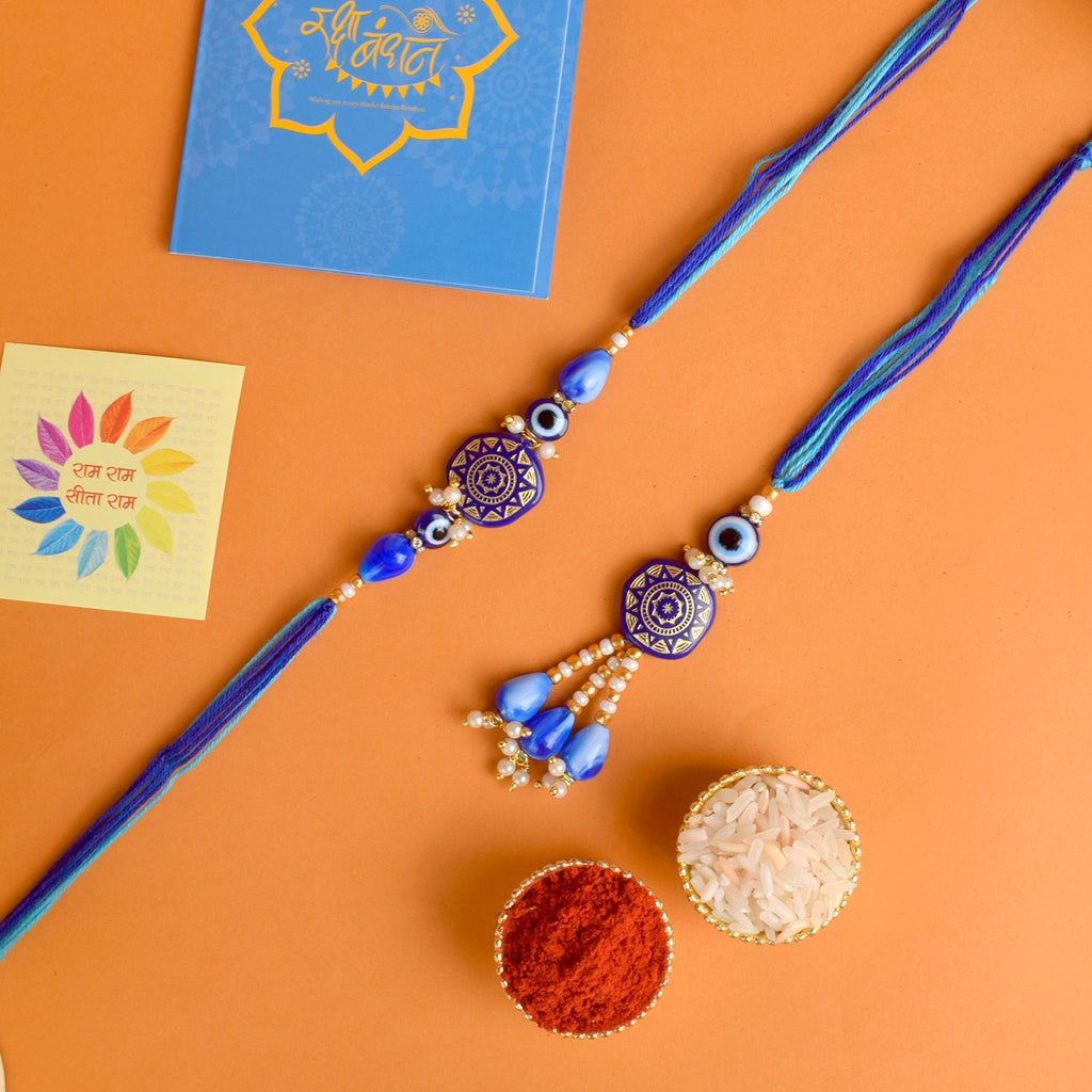 Designer Couple Rakhi Set for Bhaiya and Bhabhi with Roli Chawal and Ram Sita Stickers – Raksha Bandhan Gift Combo. India’s Largest Brass Idols Brand - www.satvikstore.in