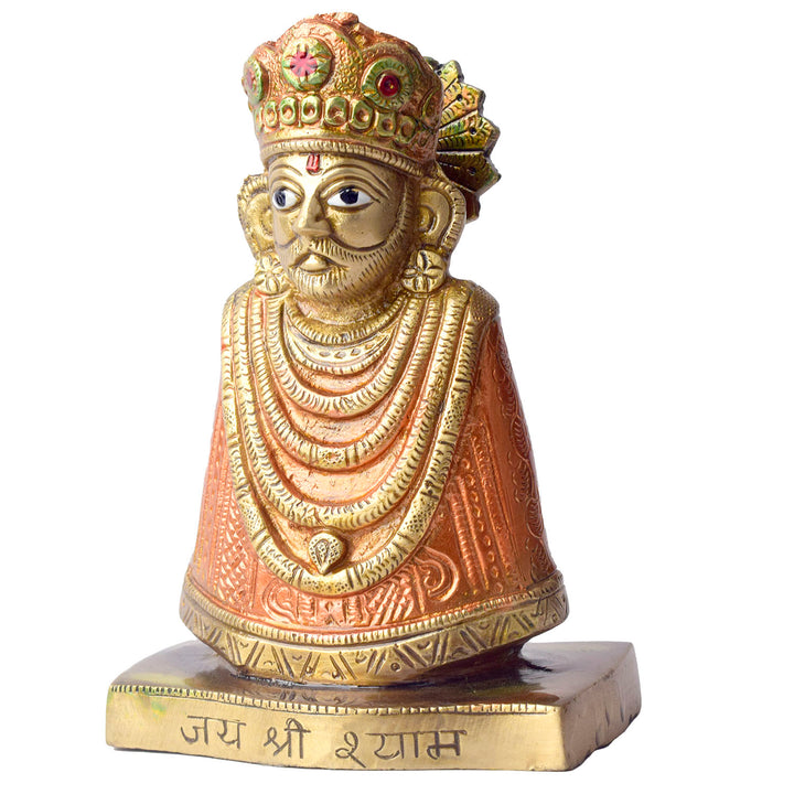  This 6.3-inch Khatu Shyam idol is a symbol of divine grace, devotion, and spiritual protection. Crafted with exquisite detail, it beautifully captures the serene expression of Lord Khatu Shyam, a revered deity known for bestowing blessings of prosperity, health, and happiness upon his devotees. 