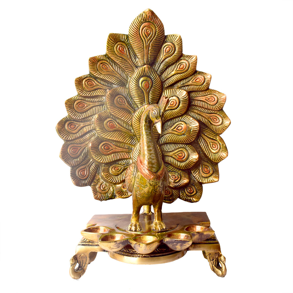 Satvik Stores Presents Stylish Peacock Panch Diya.&nbsp;Any festive occasion will be made wonderfully auspicious by the grace and beauty of the Peacock Brass Handcrafted Hanging Diya. Given that it was made by hand, the piece's abnormalities and flaws only serve to enhance Diya's allure and charisma. 
