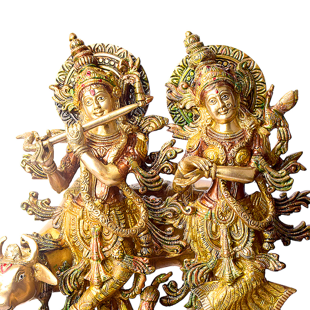 This Lovely Radha Krishna with Cow Colorful Brass Idol beautifully portrays the divine love and grace of Radha and Krishna, accompanied by the sacred cow. Handcrafted from high-quality brass and adorned with vibrant colors, this idol exudes spiritual charm and elegance.