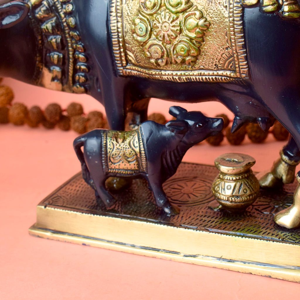 This 6.7-inch Kamdhenu cow figurine is a beautiful representation of purity, prosperity, and spiritual blessings. Known as the divine cow in Hindu mythology, Kamdhenu is believed to grant every wish and bring abundance to its devotees. Crafted with intricate details, this figurine exudes a sense of holiness and serenity.