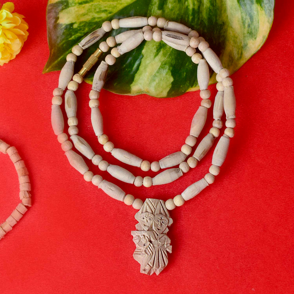 100% Original Tulsi Mala with sacred Tulsi beads and a Radha Krishna locket, ideal for devotional wear and spiritual connection. India’s Premium Jap Mala Store- www.satvikstore.in
