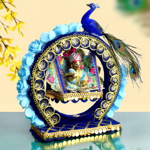 Decorative Laddu Gopal Ji Jhula with vibrant peacock design, ideal for pooja decor and Janmashtami celebrations. India’s Largest Pooja Accessories Brand – www.satvikstore.in