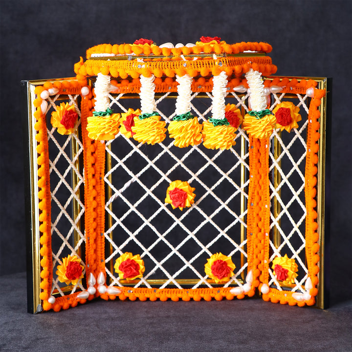 8 Inch Decorative Orange Pretentious Ganesha Phool Bangla featuring vibrant floral backdrop for Ganpati decoration at home or mandap. India’s Largest Pooja Accessories Brand – www.satvikstore.in