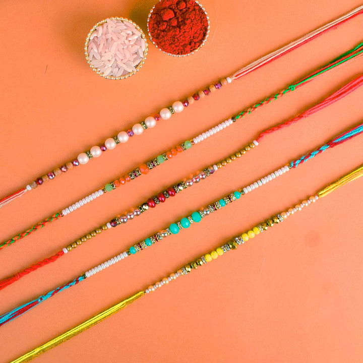 Set of 5 Designer Rakhi Threads with Roli Chawal and Ram Sita Stickers for Raksha Bandhan Celebration. India’s Largest Pooja Accessories Brand - www.satvikstore.in