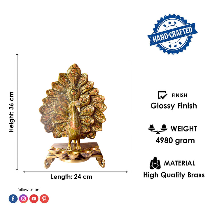 Satvik Stores Presents Stylish Peacock Panch Diya.&nbsp;Any festive occasion will be made wonderfully auspicious by the grace and beauty of the Peacock Brass Handcrafted Hanging Diya. Given that it was made by hand, the piece's abnormalities and flaws only serve to enhance Diya's allure and charisma. 