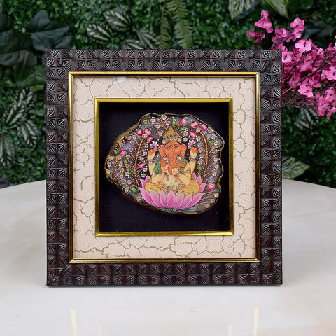 Divine Agate Ganesha Wooden Photo Frame showcasing a beautifully carved Ganesha idol made from natural agate stone, set in an elegant wooden frame, perfect for spiritual home decor and gifting. India’s Largest Pooja Accessories Brand – www.satvikstore.in