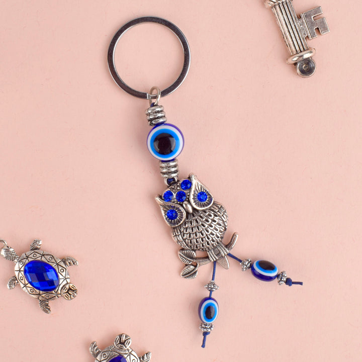 Elegant Blue Evil Eye Keychain, a protective charm and stylish accessory perfect for gifts, home, bag, or car. India’s Largest Pooja Accessories Brand – www.satvikstore.in