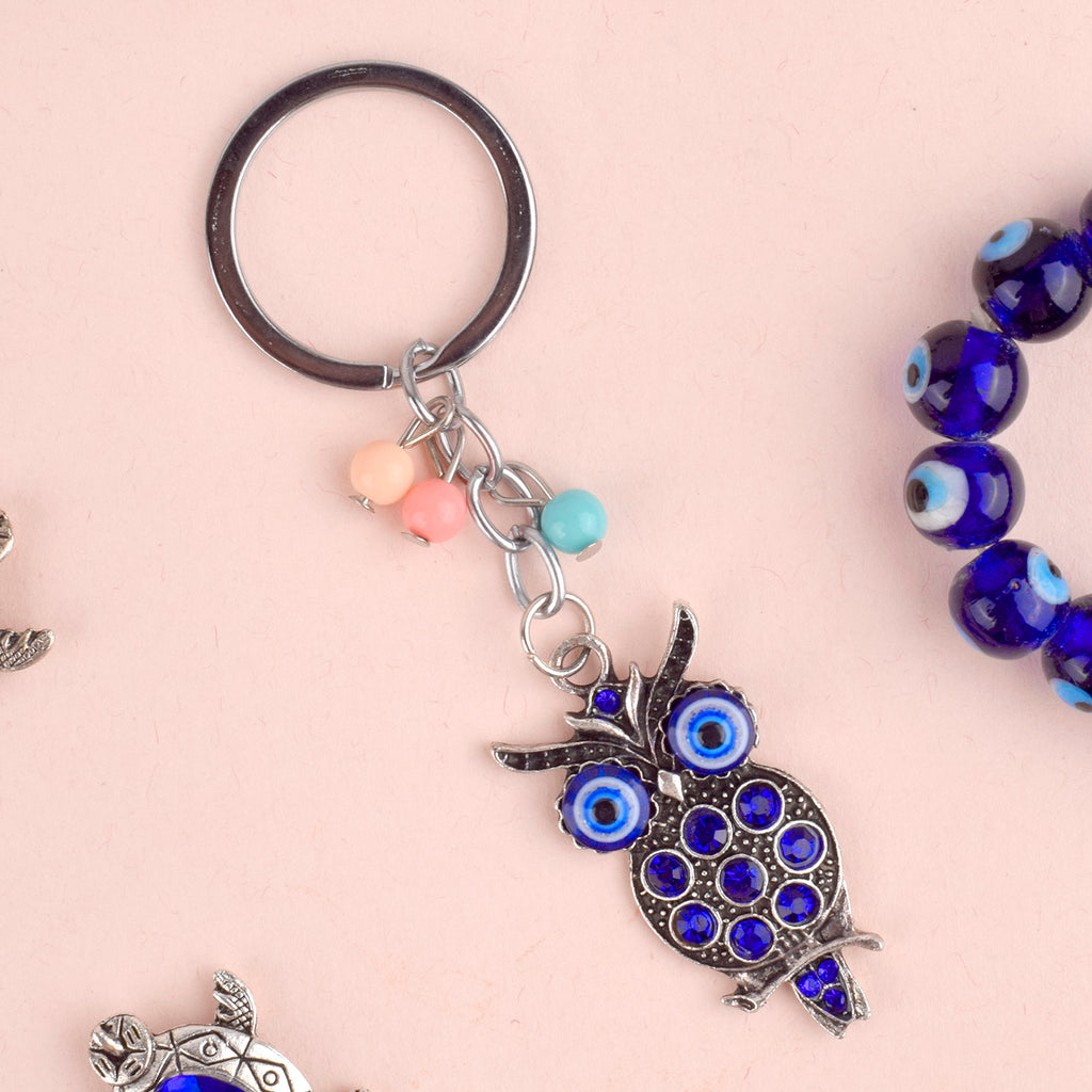Evil Eye Owl Keychain – A Feng Shui good luck charm designed to bring protection, wisdom, and fortune into your life. India’s Largest Pooja Accessories Brand – www.satvikstore.in