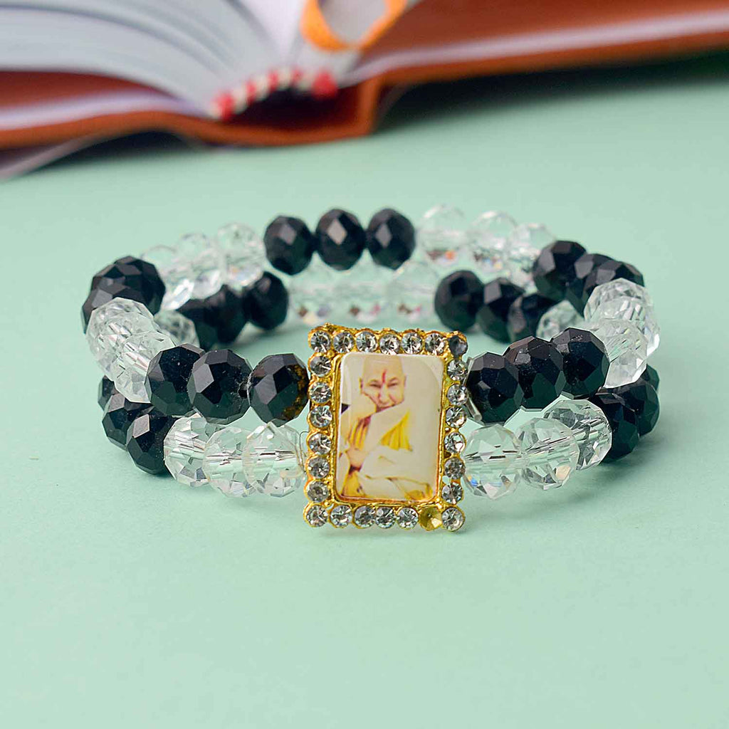 Guruji Swaroop Bracelet featuring clear and black beads – perfect for daily wear, spiritual occasions, and gifting. India’s Largest Pooja Accessories Brand – www.satvikstore.in