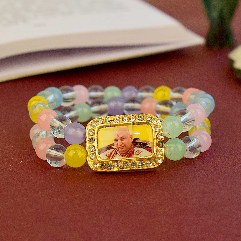 Guruji Swaroop Bracelet featuring clear and multicoloured beads – perfect for daily wear, spiritual occasions, and gifting. India’s Largest Pooja Accessories Brand – www.satvikstore.in