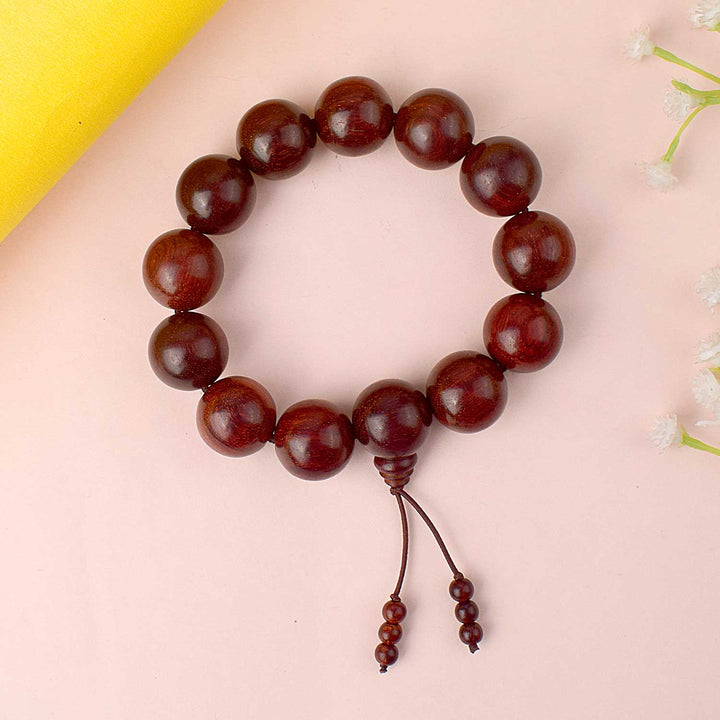 Original 13 Beads Red Chandan Bracelet made from 18mm sandalwood beads of Andhra Pradesh. India’s Largest Pooja Accessories Brand - www.satvikstore.in 
