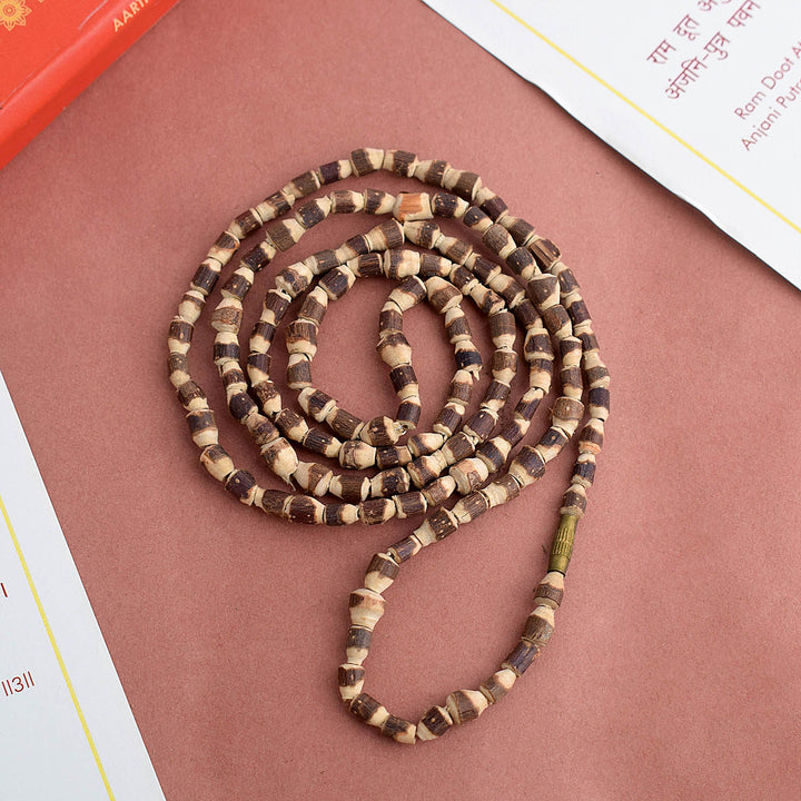 Original Tulsi Mala featuring hand-carved natural Tulsi beads, used for Japa, prayer, and spiritual healing. India’s Premium Jap Mala Store- www.satvikstore.in
