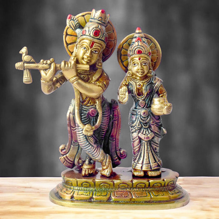The 6.7 Inch Sacred Radha Krishna Idol – Embrace of Love and Devotion beautifully captures the divine bond between Radha and Krishna, symbolizing pure love and unwavering devotion. This intricately designed idol portrays the eternal couple in a graceful embrace, with Krishna holding his flute and Radha by his side, radiating serenity and spiritual harmony.