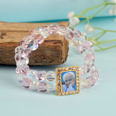 Pink & Clear Shiny Beads Double Layer Guruji Swaroop Bracelet featuring delicate pink and luminous clear beads with Jai Guruji Swaroop – perfect for spiritual wear, festive gifting, and daily devotion. India’s Largest Pooja Accessories Brand – www.satvikstore.in