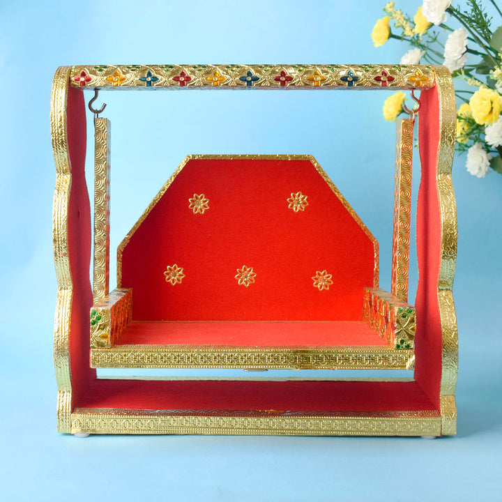 Red Velvet and Meenakari handcrafted Laddu Gopal Jhula with ornate design, ideal for Bal Gopal during Janmashtami and pooja rituals. India’s Largest Pooja Accessories Brand – www.satvikstore.in
