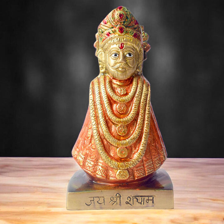 This 6.3-inch Khatu Shyam idol is a symbol of divine grace, devotion, and spiritual protection. Crafted with exquisite detail, it beautifully captures the serene expression of Lord Khatu Shyam, a revered deity known for bestowing blessings of prosperity, health, and happiness upon his devotees.