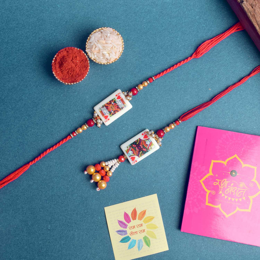 Designer Couple Rakhi Set for Bhaiya and Bhabhi with Roli Chawal and Ram Sita Stickers – Raksha Bandhan Gift Combo. India’s Largest Brass Idols Brand - www.satvikstore.in