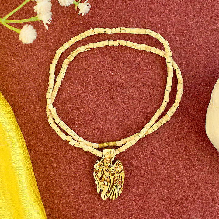 Wooden Radha Krishna Locket – handcrafted devotional pendant featuring Radha and Krishna made from wood, symbolizing divine love, peace, and spiritual connection. India’s Largest Brass Idols Brand - www.satvikstore.in
