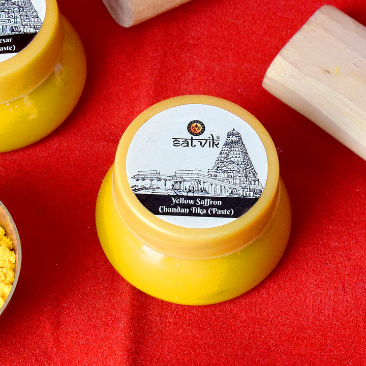 Yellow Saffron Chandan Tika Paste (Chandan Tilak) is ideal for daily pooja rituals, spiritual gatherings, and temple use. Known for its calming aroma and sacred symbolism, it brings purity and devotion to every religious ceremony – India’s Largest Pooja Accessories Brand – www.satvikstore.in