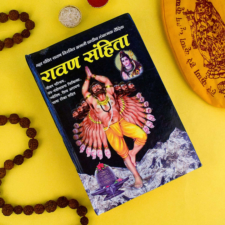 Cover image of "Raavan Sanhita Book - Ancient Hindu Astrology & Tantrik Knowledge" featuring traditional illustrations of Raavan and symbolic tantric elements associated with Vedic astrology and spiritual wisdom. India’s Largest Pooja Accessories Brand – www.satvikstore.in
