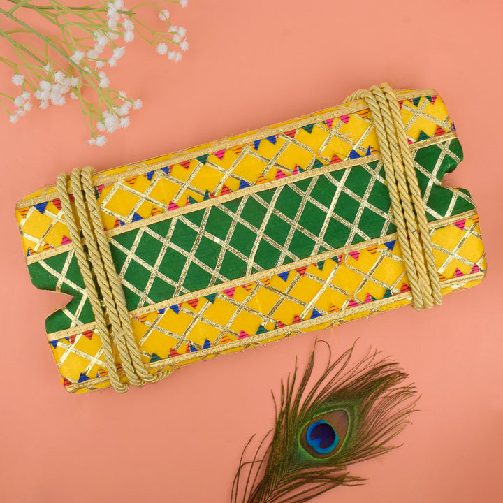 Bloom-themed yellow and green decorative Jhula for Hariyali Teej, designed for Lord Krishna idol with festive floral detailing. India’s Largest Pooja Accessories Brand – www.satvikstore.in