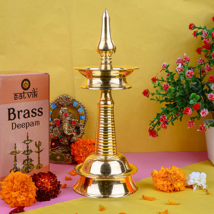 11 Inch Small Brass Kerala Diya – AKP NilaVilakku Deepam – Traditional handcrafted brass pooja lamp for spiritual rituals and home décor. India’s Largest Pooja Accessories Brand – www.satvikstore.in
