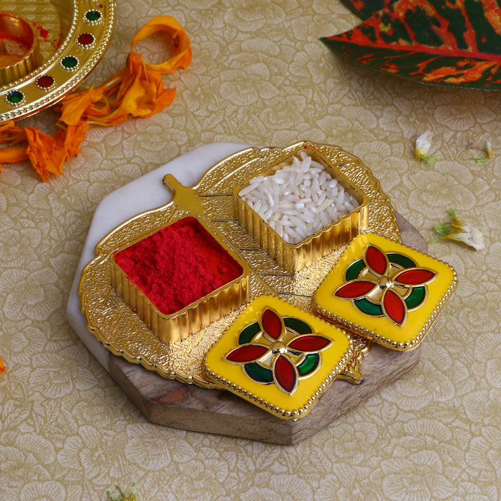 Adorable Roli Akshat Platter, beautifully designed tray for holding roli and akshat during pooja rituals, tilak ceremonies, and festive occasions. 
India’s Largest Pooja Accessories Brand – www.satvikstore.in 
