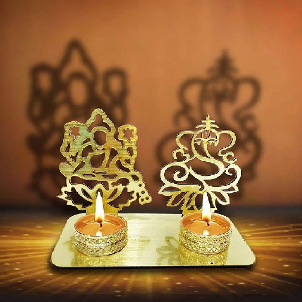 Decorative Lord Ganesha and Lakshmi Shadow Diya, a beautifully crafted metal lamp featuring the divine images of Lord Ganesha and Goddess Lakshmi, casting elegant shadows when lit. Ideal for festive occasions, puja ceremonies, and home decor. India’s Largest Pooja Accessories Brand – www.satvikstore.in