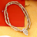 100% Pure Pleasing Tulsi Mala with natural Tulsi beads and a Radha locket, perfect for spiritual devotion, prayer, and meditation. India’s Premium Jap Mala Store- www.satvikstore.in
