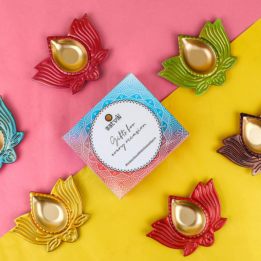 Prepossessing Multicolor Lotus Shape Diya – A beautifully crafted diya designed in the shape of a lotus, featuring vibrant multicolor accents. India’s Largest Pooja Accessories Brand – www.satvikstore.in